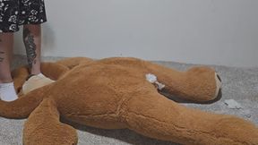 Chrissy trampling big stuffy in white socks