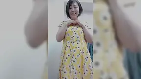 Humiliating Asian OLDER WOMAN strips and poses on back for mature Japanese video