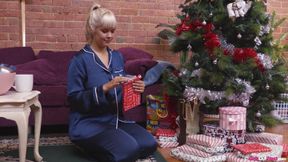 Big titted blonde fucks her wet pussy with sex toy at Christmas