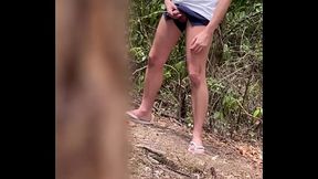 Boy caught peeing in the woods