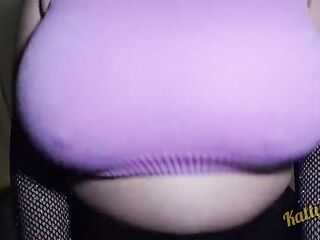 Katty Milk shakes her giant natural titties in pink clothing in front of the camera / Taking off raiment
