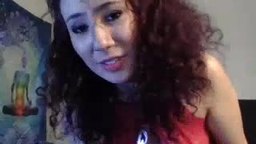 A Sexy Lady in Red Fingers Her Pussy