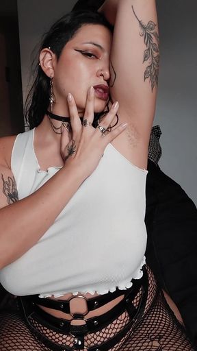 Sexy tattooed woman in fishnet bodysuit