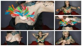 Tattooed, kinky girl hangs the maximum number of clothespins on her big tits