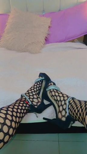 enjoy my beautiful feet with heels and my mesh stockings