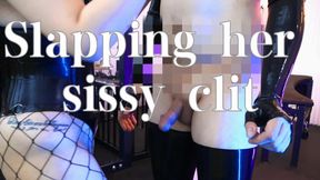 Latex sissy gets her clit slapped