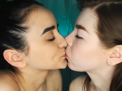 Sexy Lesbos Kiss and Finger Their Pussies