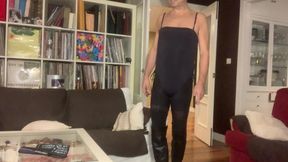 Runway in bodysuit and leather boots with heels