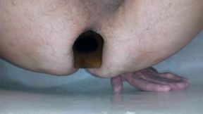 Anus stretching and prostate massage with huge plug