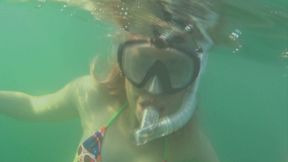 Alla swims underwater and wears a diving mask and a snorkel!!!