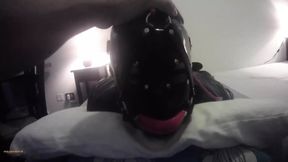 Laura is hogtied in latex catsuite and high heels, throated with a lip open mouth gag POV