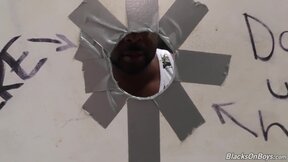 ”Bearded guy sucks a ebony shaft at a gloryhole”