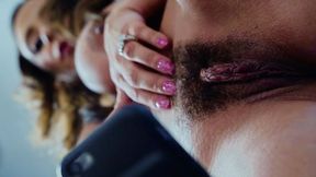 Amateur milf fucks herself with fingers rubbing her big clit on camera