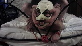 She's tied up on a bed wearing pantyhose and high heels, roughly throated and hard fucked