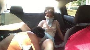 Petite girlfriend licks his cock while sitting in the back of a taxi