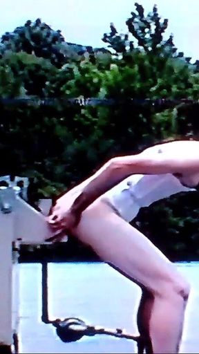 Crossdresser Riding a Giant Dildo on a Roof Top