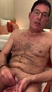 Naked daddy jerkjing off in a hotel room