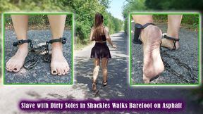 Slave with Dirty Soles in Shackles Walks Barefoot on Asphalt - Bondage - Shackles - Foot fetish - Peeping - Woman training - Chains - Clinking chains on asphalt - Walking barefoot in the forest - Muscular calves - Short skirt - Foot worship - Dirty soles