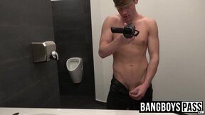 Jock films himself in bathroom before stroking his big dick