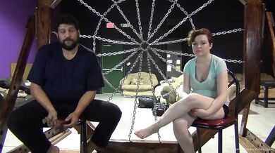 Busty redhead gets tied up with rope and teased