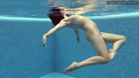 ”Czech babe Lady Dee takes her shorts off in the pool”