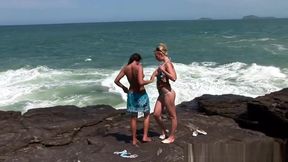 Two naughty girls drive to a desolate spot on the beach