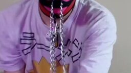 Pink Mask Puppy Wags His Tail with Leash in Mouth