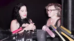 Two FemDommes dominate and train submissive slave in the dungeon
