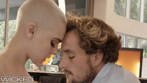 Gorgeous bald girl gets laid with a passionate lover on a couch