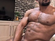 Bodybuilder Benji Bastian strokes thick cock