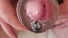 Close-up vibrating sleeve masturbation with cumshot