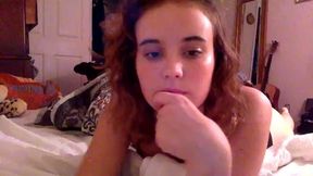 Babe Chatting to Her Client on Her Bed