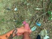 Glossy glans with precum cums at the cruising sex area