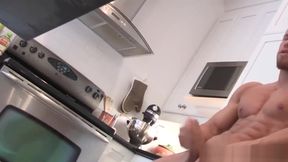 Handsome blonde hunk jerking off in the kitchen