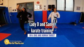 Lady D and Samy karate training on a bag and human target