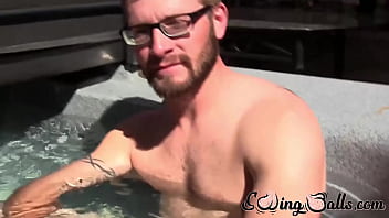 Gay with glasses shows balls before masturbating with buddy