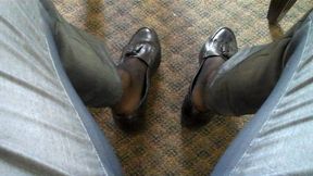 Gio wearing black ultra sheer socks and loafers