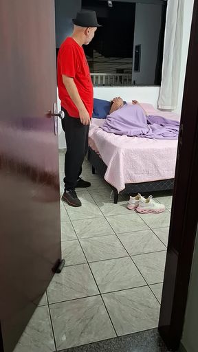 Stepfather helps stepdaughter take off her clothes to go to bed.