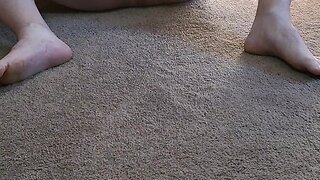 Bearded papa bear pleasuring himself on the ground