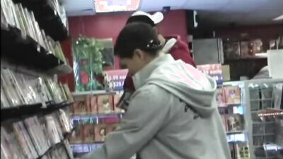 Naughty twink goes to a gloryhole to suck a throbbing cock