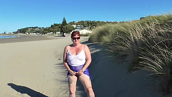 Kiwi trashy MILF made to walk in see through clothes at the beach before being creampie fucked in plain view