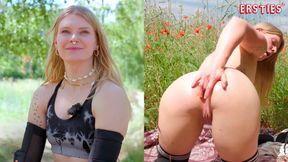 First-year biker Katja E relaxes on the meadow with dildo and butt plug