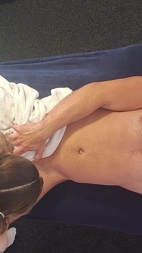 Female Hands Work Deep on His Post-gym Body Birds Eye View