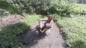 Naughty and hot Dildo fucking in the mud