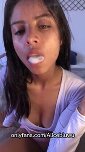 Cute brunette latina in sexy pink shorts