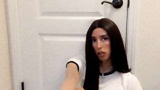 Adorable Tgirl takes off her footwear