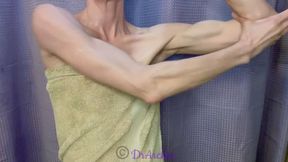 DrArches Oils Her Biceps after a Shower