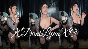 Smoking in Bodysuit and Thigh High Boots