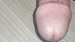 Intense close up of a guy stroking his cock