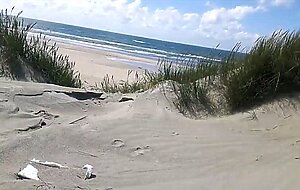 Exhibitionist Strokes Hard on the Beach